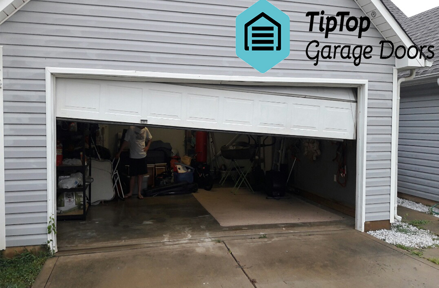 Fixing garage door of track